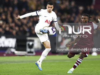 Pedro Porro of Tottenham Hotspur is controlling the ball during the Premier League match between West Ham United and Tottenham Hotspur at th...