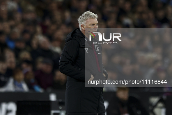 David Moyes, manager of West Ham United, is standing on the touchline during the Premier League match between West Ham United and Tottenham...