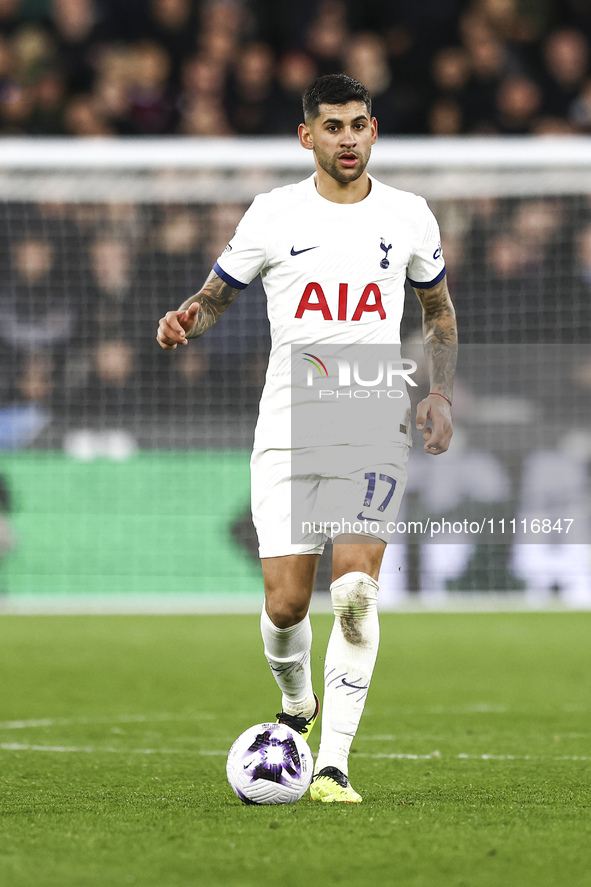 Cristian Romero of Tottenham Hotspur is on the ball during the Premier League match between West Ham United and Tottenham Hotspur at the Lon...