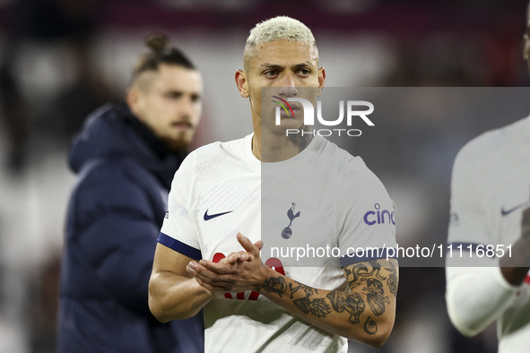 Richarlison of Tottenham Hotspur is leaving the pitch at the end of the Premier League match between West Ham United and Tottenham Hotspur a...