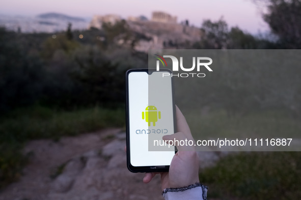 The Android logo is displayed on a smartphone screen in Athens, Greece, on April 3, 2024. (Photo Illustration by Nikolas Kokovlis/NurPhoto)