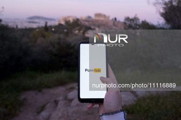 The Pornhub logo is being displayed on a smartphone screen in Athens, Greece, on April 3, 2024. (Photo Illustration by Nikolas Kokovlis/NurP...