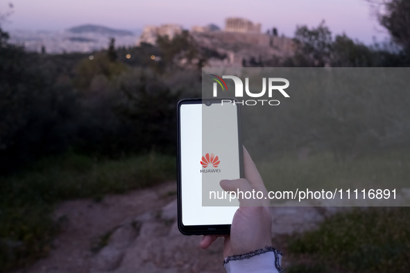 The Huawei logo is displayed on a smartphone screen in Athens, Greece, on April 3, 2024. (Photo Illustration by Nikolas Kokovlis/NurPhoto)
