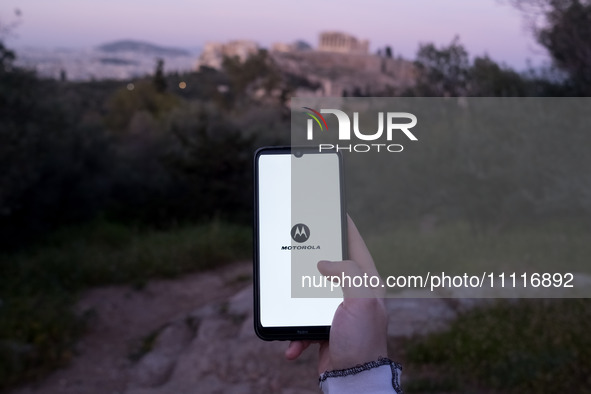 The Motorola logo is displayed on a smartphone screen in Athens, Greece, on April 3, 2024. (Photo Illustration by Nikolas Kokovlis/NurPhoto)
