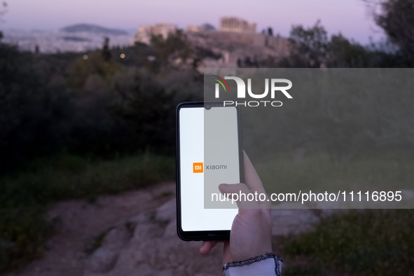The Xiaomi logo is displayed on a smartphone screen in Athens, Greece, on April 3, 2024. (Photo Illustration by Nikolas Kokovlis/NurPhoto)