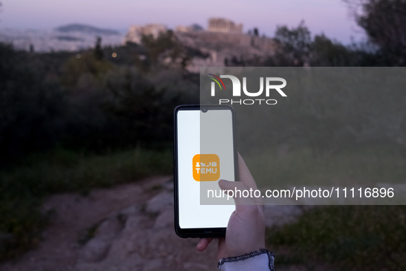 The Temu logo is displayed on a smartphone screen in Athens, Greece, on April 3, 2024. (Photo Illustration by Nikolas Kokovlis/NurPhoto)