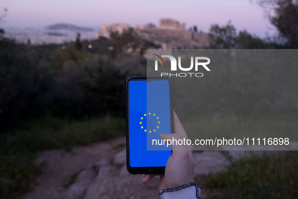 The European Union (EU) flag is displayed on a smartphone screen in Athens, Greece, on April 3, 2024. (Photo Illustration by Nikolas Kokovli...