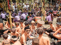 The 'monsters' of Tegallalang are gathering for a communal feast, enjoying the Magibung tradition before they embark on their colorful proce...