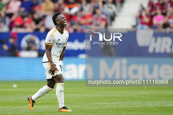 Vinicius Junior left winger of Real Madrid and Brazil reacts during the LaLiga EA Sports match between CA Osasuna and Real Madrid CF at Esta...