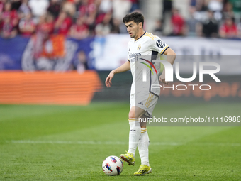 Brahim Diaz attacking midfield of Real Madrid and Spain controls the ball during the LaLiga EA Sports match between CA Osasuna and Real Madr...