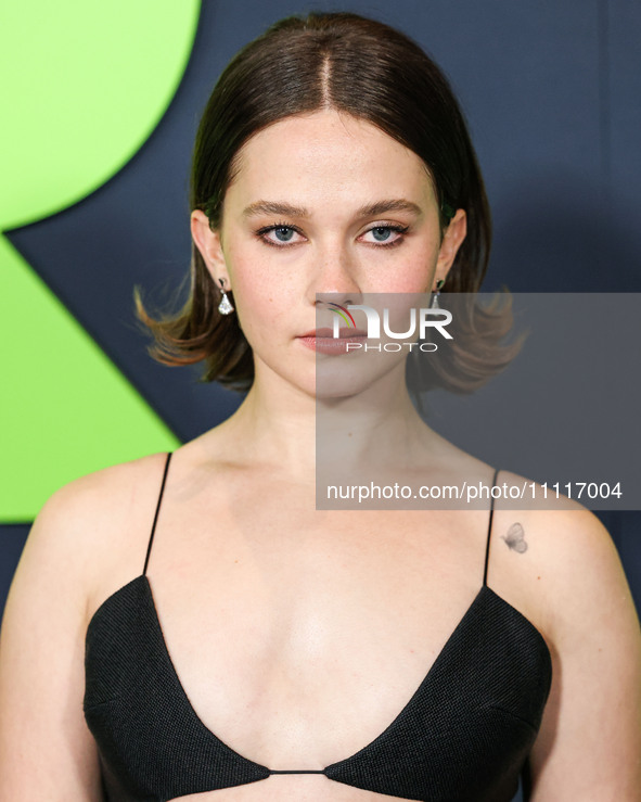 Cailee Spaeny wearing a dress by Christopher Esber arrives at the Los Angeles Special Screening Of A24's 'Civil War' held at the Academy Mus...