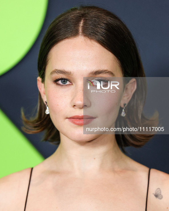 Cailee Spaeny wearing a dress by Christopher Esber arrives at the Los Angeles Special Screening Of A24's 'Civil War' held at the Academy Mus...