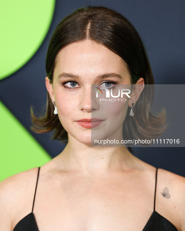 Cailee Spaeny wearing a dress by Christopher Esber arrives at the Los Angeles Special Screening Of A24's 'Civil War' held at the Academy Mus...