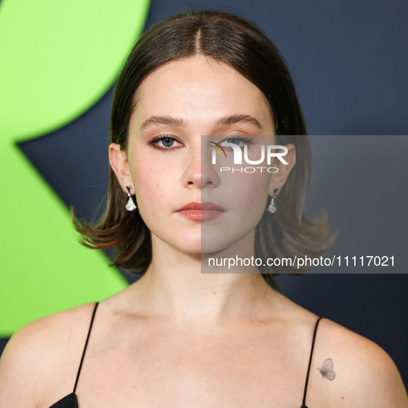 Cailee Spaeny wearing a dress by Christopher Esber arrives at the Los Angeles Special Screening Of A24's 'Civil War' held at the Academy Mus...