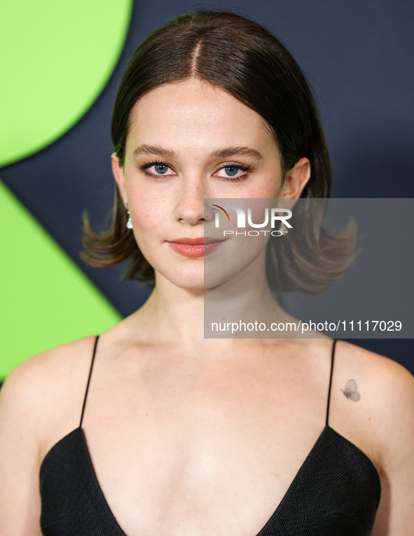 Cailee Spaeny wearing a dress by Christopher Esber arrives at the Los Angeles Special Screening Of A24's 'Civil War' held at the Academy Mus...