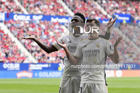 Brahim Diaz attacking midfield of Real Madrid and Spain celebrates with Vinicius Junior left winger of Real Madrid and Brazil after scoring...