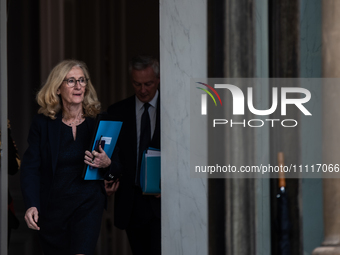 Minister of National Education Nicole Belloubet is leaving the Council of Ministers, with the Minister of the Economy Bruno Le Maire visible...