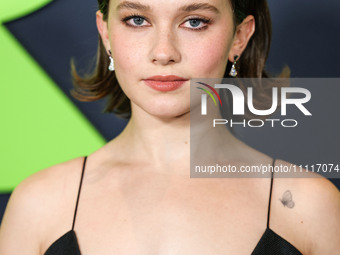 Cailee Spaeny wearing a dress by Christopher Esber arrives at the Los Angeles Special Screening Of A24's 'Civil War' held at the Academy Mus...