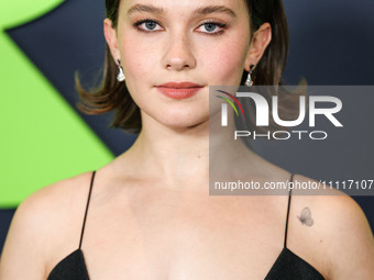 Cailee Spaeny wearing a dress by Christopher Esber arrives at the Los Angeles Special Screening Of A24's 'Civil War' held at the Academy Mus...