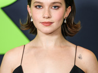 Cailee Spaeny wearing a dress by Christopher Esber arrives at the Los Angeles Special Screening Of A24's 'Civil War' held at the Academy Mus...