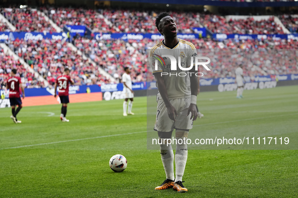 Vinicius Junior left winger of Real Madrid and Brazil protest too referee during the LaLiga EA Sports match between CA Osasuna and Real Madr...