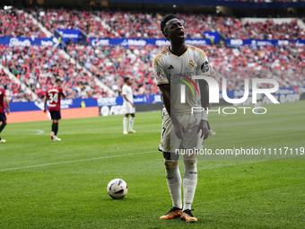 Vinicius Junior left winger of Real Madrid and Brazil protest too referee during the LaLiga EA Sports match between CA Osasuna and Real Madr...