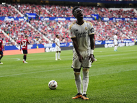 Vinicius Junior left winger of Real Madrid and Brazil protest too referee during the LaLiga EA Sports match between CA Osasuna and Real Madr...