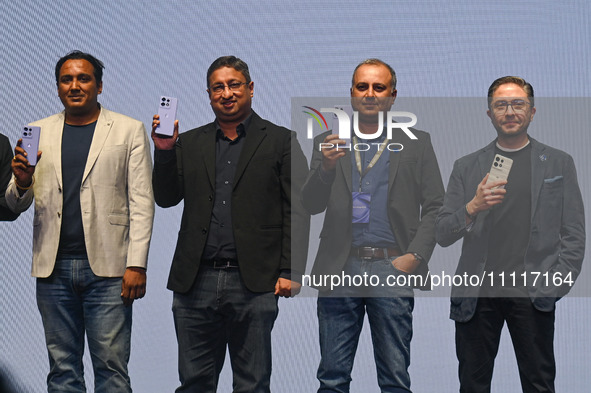TM Narasimhan, Managing Director of Motorola India, Prashanth Mani, Executive Director for the Asia Pacific region at Motorola, and Ruben Ca...