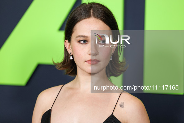 Cailee Spaeny wearing a dress by Christopher Esber arrives at the Los Angeles Special Screening Of A24's 'Civil War' held at the Academy Mus...