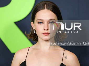 Cailee Spaeny wearing a dress by Christopher Esber arrives at the Los Angeles Special Screening Of A24's 'Civil War' held at the Academy Mus...