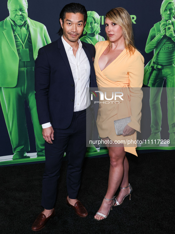 Nelson Lee and Jillana Darby arrive at the Los Angeles Special Screening Of A24's 'Civil War' held at the Academy Museum of Motion Pictures...