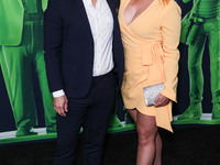 Nelson Lee and Jillana Darby arrive at the Los Angeles Special Screening Of A24's 'Civil War' held at the Academy Museum of Motion Pictures...