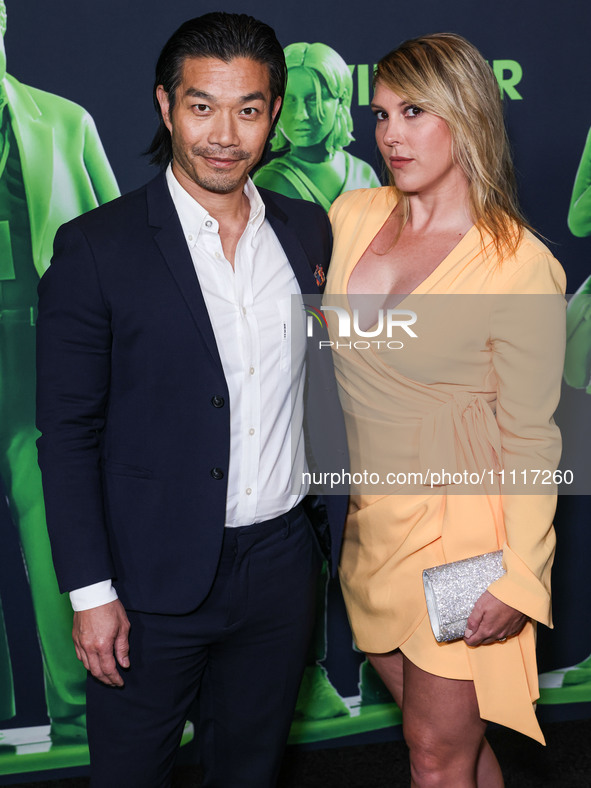 Nelson Lee and Jillana Darby arrive at the Los Angeles Special Screening Of A24's 'Civil War' held at the Academy Museum of Motion Pictures...