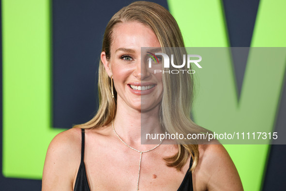 Elizabeth Gilpin wearing Prada arrives at the Los Angeles Special Screening Of A24's 'Civil War' held at the Academy Museum of Motion Pictur...