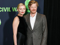 Kirsten Dunst and husband Jesse Plemons arrive at the Los Angeles Special Screening Of A24's 'Civil War' held at the Academy Museum of Motio...