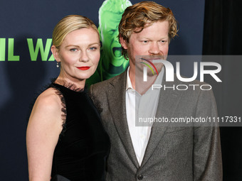 Kirsten Dunst and husband Jesse Plemons arrive at the Los Angeles Special Screening Of A24's 'Civil War' held at the Academy Museum of Motio...