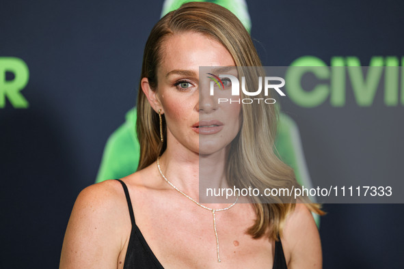 Elizabeth Gilpin wearing Prada arrives at the Los Angeles Special Screening Of A24's 'Civil War' held at the Academy Museum of Motion Pictur...