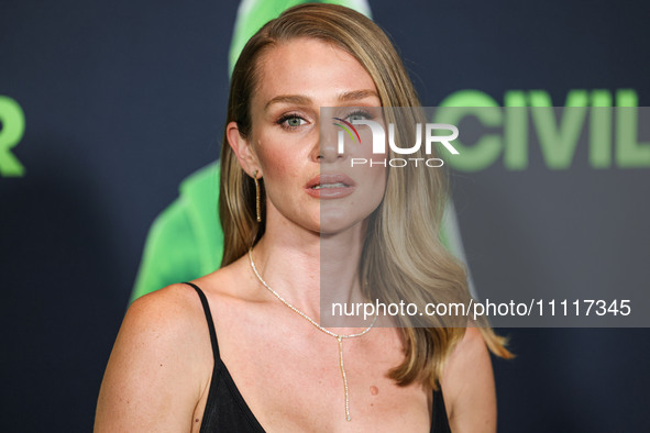 Elizabeth Gilpin wearing Prada arrives at the Los Angeles Special Screening Of A24's 'Civil War' held at the Academy Museum of Motion Pictur...