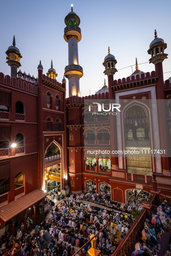 Muslim devotees are gathering at the Nakhoda Mosque as they prepare to break their fast with their Iftar meal at sunset during the Holy mont...