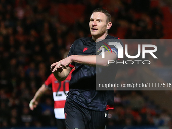 Paul Mullin of Wrexham is playing in the Sky Bet League 2 match between Doncaster Rovers and Wrexham at the Keepmoat Stadium in Doncaster, o...