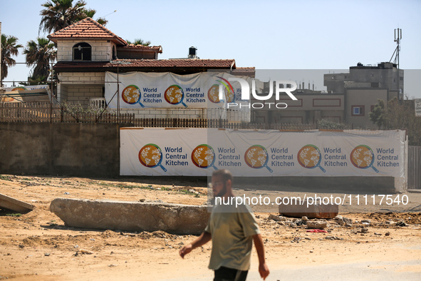A Palestinian man is walking in front of the closed headquarters of the World Central Kitchen two days after a convoy of the NGO was hit in...