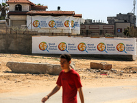 A Palestinian man is walking in front of the closed headquarters of the World Central Kitchen two days after a convoy of the NGO was hit in...