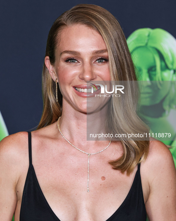 Elizabeth Gilpin wearing Prada arrives at the Los Angeles Special Screening Of A24's 'Civil War' held at the Academy Museum of Motion Pictur...