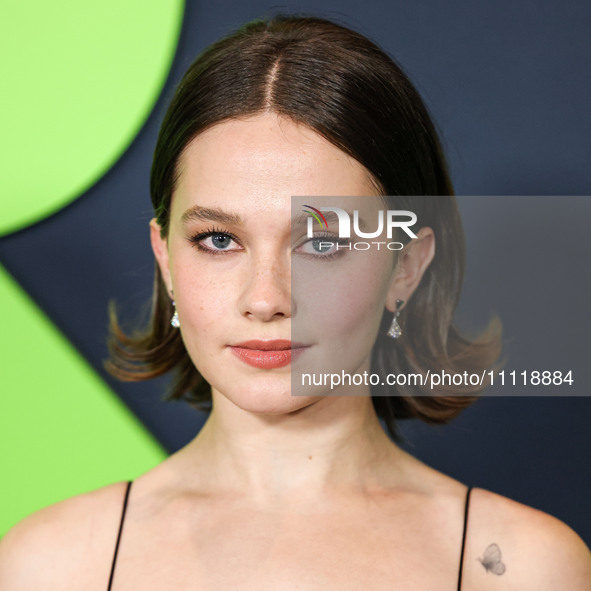 Cailee Spaeny wearing a dress by Christopher Esber arrives at the Los Angeles Special Screening Of A24's 'Civil War' held at the Academy Mus...