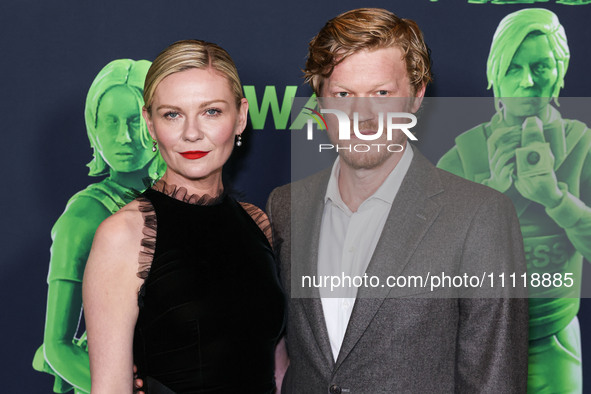 Kirsten Dunst and husband Jesse Plemons arrive at the Los Angeles Special Screening Of A24's 'Civil War' held at the Academy Museum of Motio...