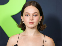 Cailee Spaeny wearing a dress by Christopher Esber arrives at the Los Angeles Special Screening Of A24's 'Civil War' held at the Academy Mus...