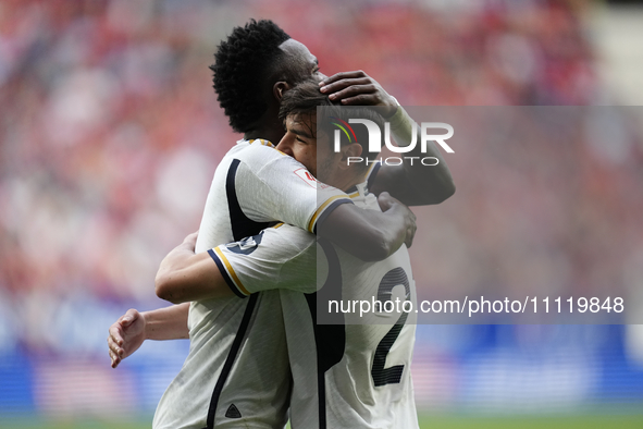 Brahim Diaz attacking midfield of Real Madrid and Spain celebrates with Vinicius Junior left winger of Real Madrid and Brazil after scoring...