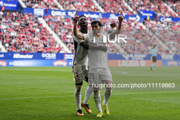 Brahim Diaz attacking midfield of Real Madrid and Spain celebrates with Vinicius Junior left winger of Real Madrid and Brazil after scoring...