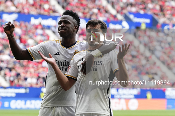 Brahim Diaz attacking midfield of Real Madrid and Spain celebrates with Vinicius Junior left winger of Real Madrid and Brazil after scoring...