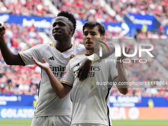 Brahim Diaz attacking midfield of Real Madrid and Spain celebrates with Vinicius Junior left winger of Real Madrid and Brazil after scoring...